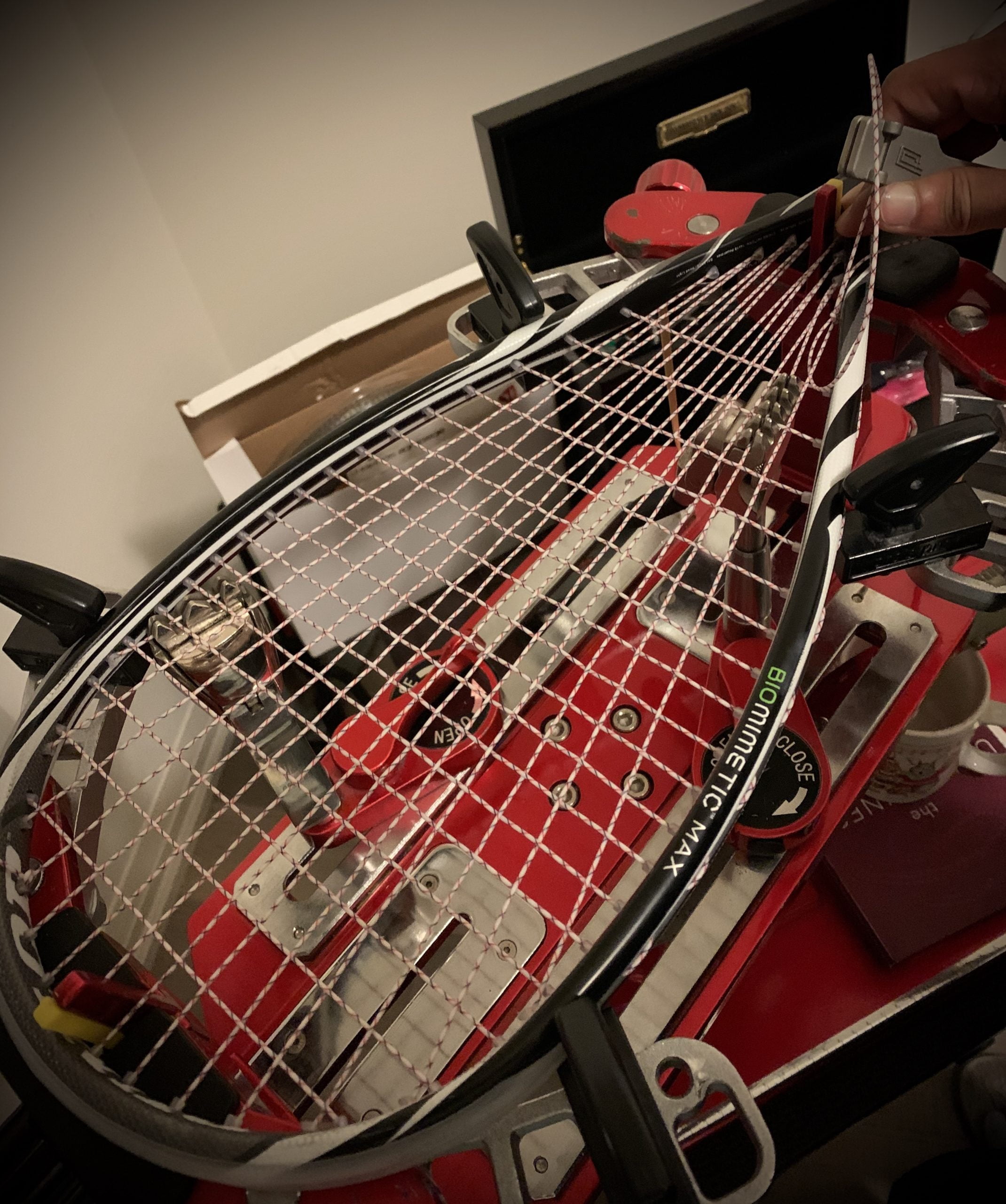how do you string a tennis racket