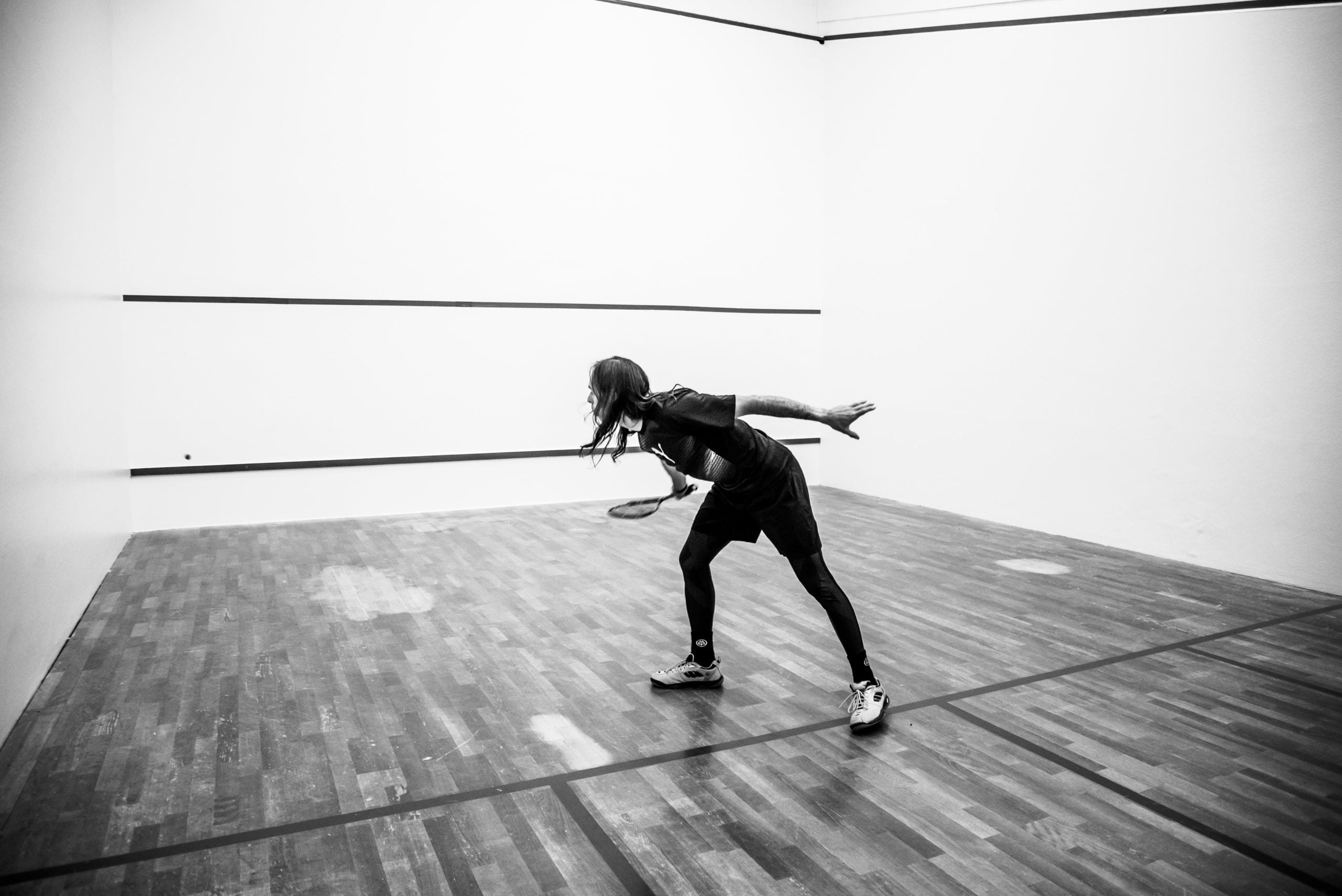How do you warm-up for a squash game?
